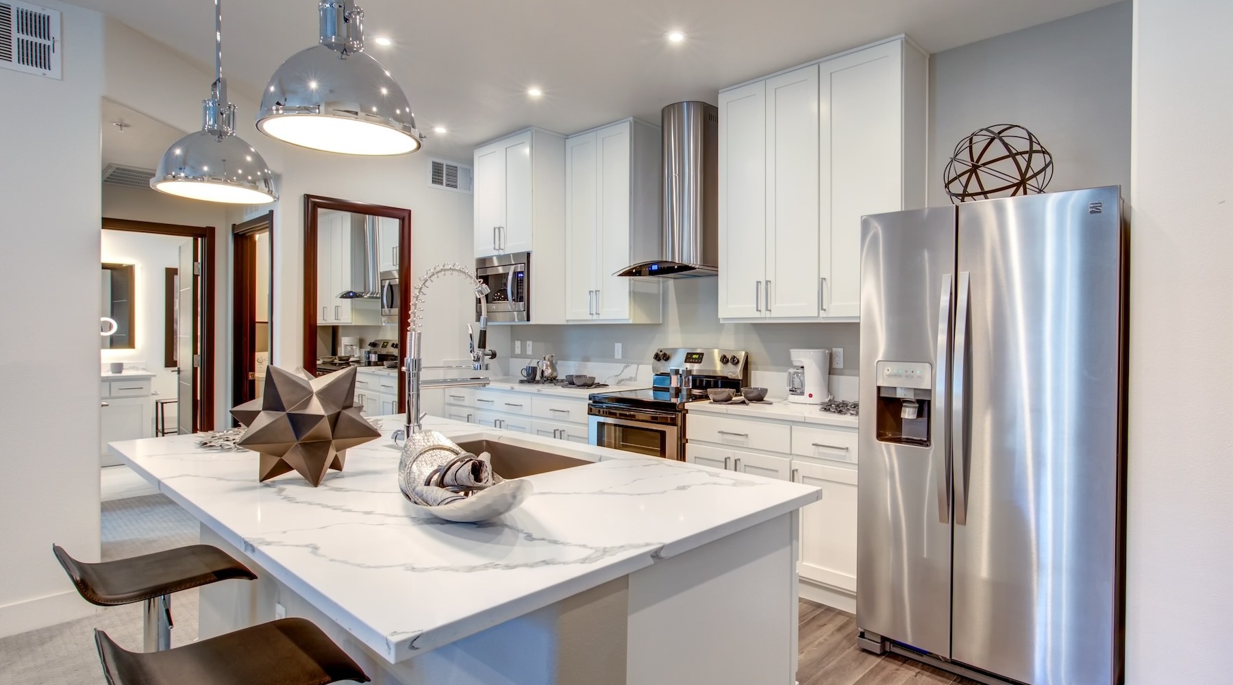 kitchen with an island and bar stools