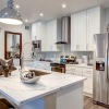 kitchen with an island and bar stools